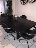 MODERN BLACK KITCHEN TABLE AND 4 ROLLING CHAIRS