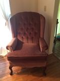Rose colored velvet Wing Chair.