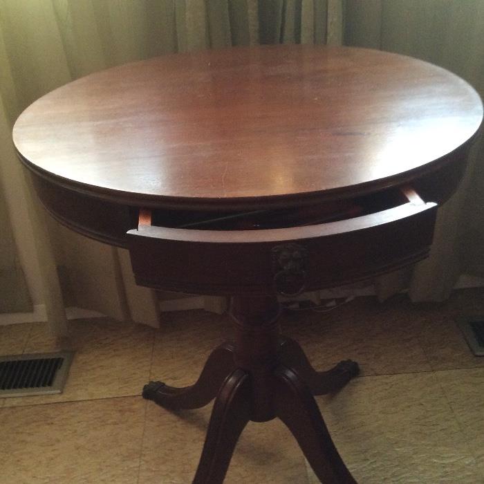 Duncan Phyfe style side table with Brass Claw feet.