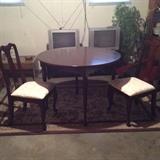 Bombay Company small round Mahogany table and two chairs.