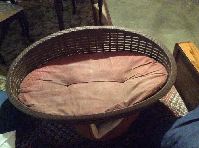 Old basket dog bed.