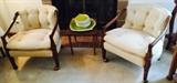 One of two pairs of living room chairs