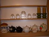 plenty of glass/bakeware including some tea pots and vintage canister sets