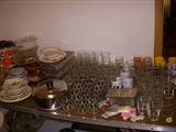 it doesn't look so great in the picture, but there's several glass sets, individual pieces, vintage bakeware....