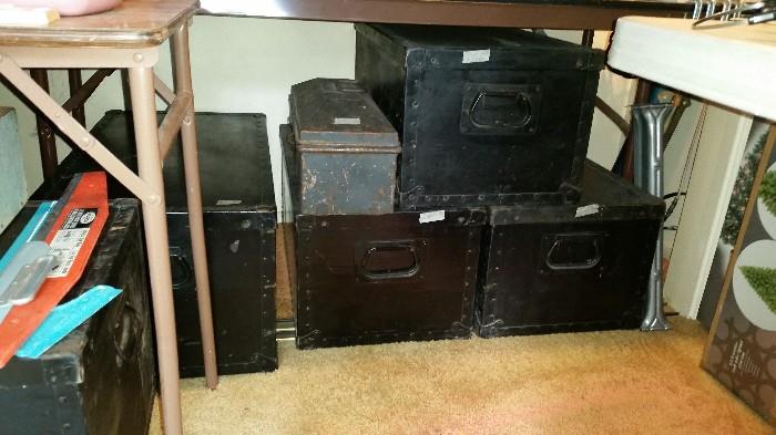 Great vintage military trunks & tool boxes.