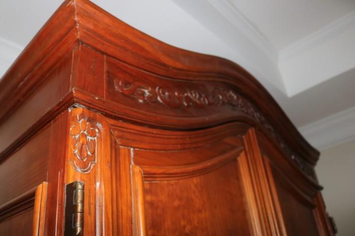 carved armoire detail