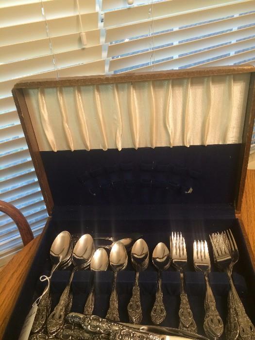 Stainless dinner ware in case
