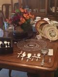 One of several floral arrangements; hand-painted plated; silver plate serving pieces