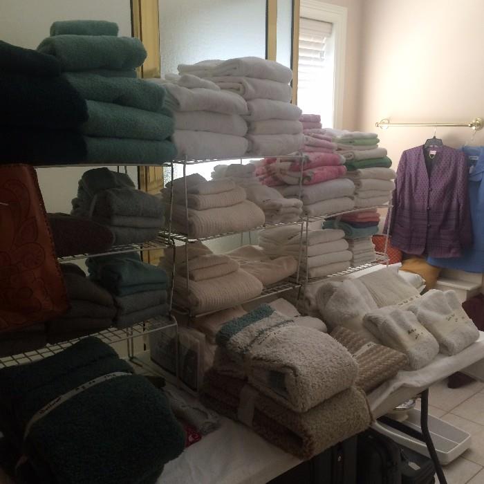 Large selection of linens, towels, and bedding