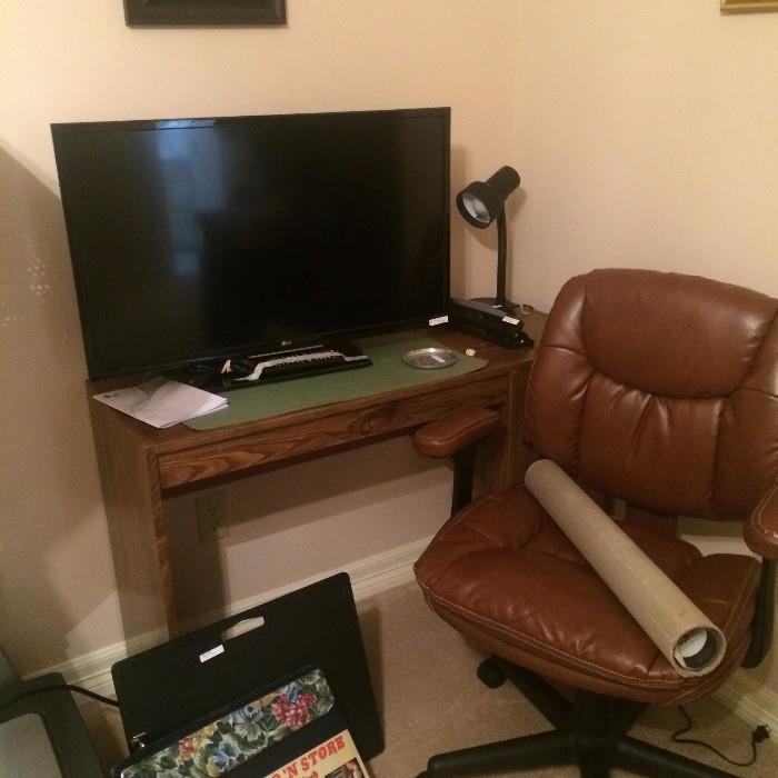 Flat-screen TV & office chair