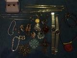small sampling of the large selection of jewelry. Includes gold, sterling, stone, watches, and costume