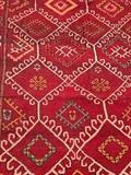 Striking red and yellow geometric Moroccan ‘tribal’, most likely Berber, pattern rug in beautiful condition.  Measures 75” x 127” (6’ 5” x 10’ 7”) 
Note: The edging fringe is not a consistent length from end to end. Asking price  $1,850. NOW $1,500!