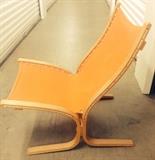 Siesta Bentwood Chair. 
Siesta chair, circa 1970s, made of orange sailcloth and wood. This is a shorter version of the high-back chair measuring 32”H x 25”W x 17D. Base measures 28” from front to back. These are not marked however they could possibly be Westnofa, the detail is that good.
Some discoloring to the sailcloth as expected with the age of the chair. Wood oil will bring back the wood to perfection. Asking price  $450. NOW $300!