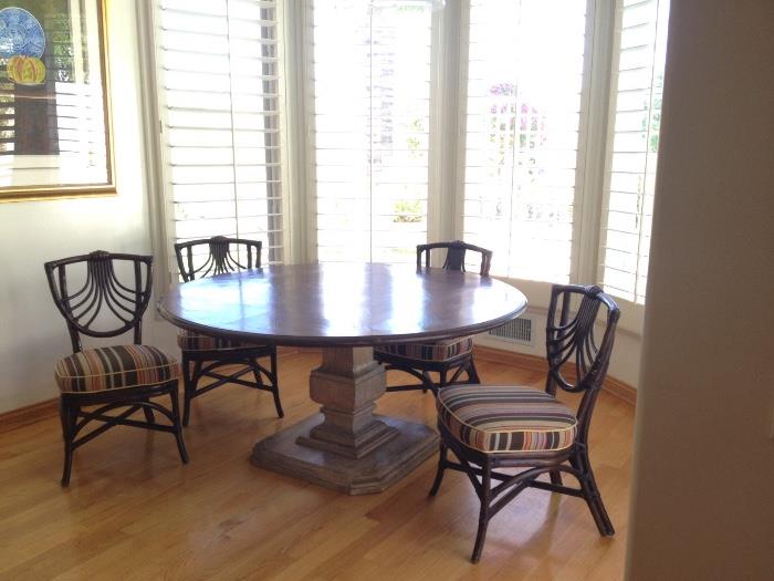 Large French style dining table and rattan chairs