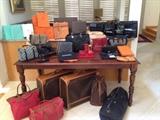High end designer bags Louis Vuitton suitcases, vintage Gucci, Christian Dior Hermes belts scarves, Chanel bags, and much more