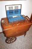 Vintage tea cart and silverware
