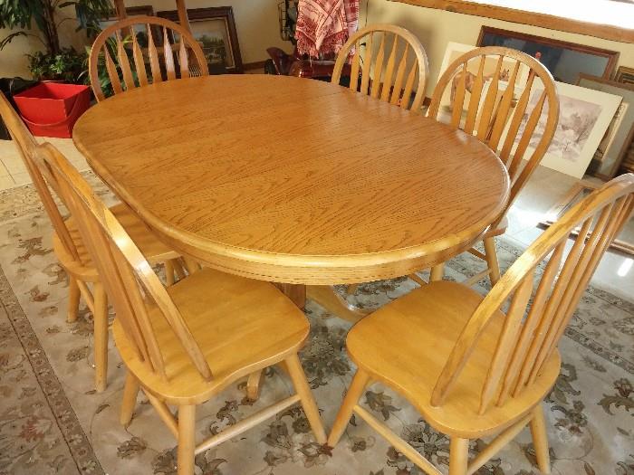 Oak dining table with leaf and 6 chairs