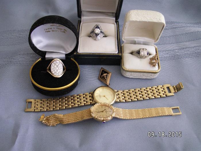 Two antique platinum, diamond and sapphire rings, oval gold ring with 23 diamonds, vintage gold insignia pins, citizen watch, gold Baume Mercier watch