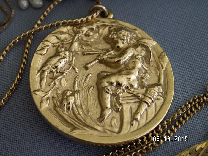 Large, gold 'Pan' pendant