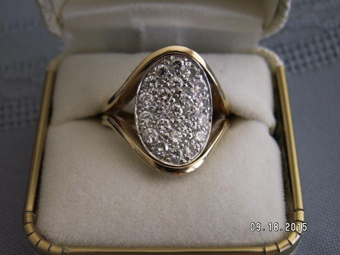 Gold oval ring with 23 diamonds