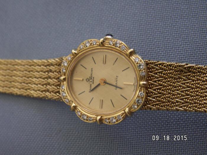 Gold Baume & Mercier watch
