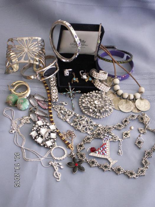 Costume jewelry including sterling silver, rhinestones, and brand names