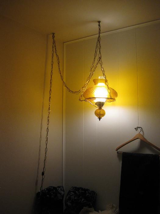 Amber glass hanging light fixture.