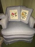 Small armchair with needlepoint pillows