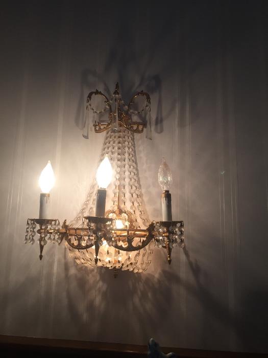 Set of two brass and Crystal sconces