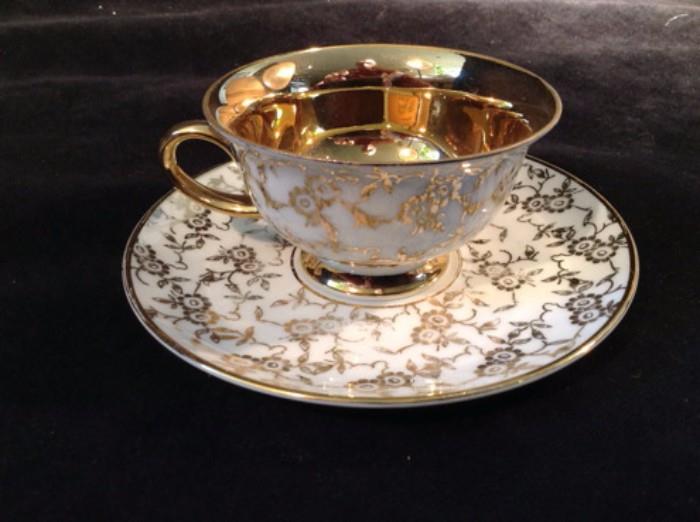 Vintage teacups with saucers and dessert plate