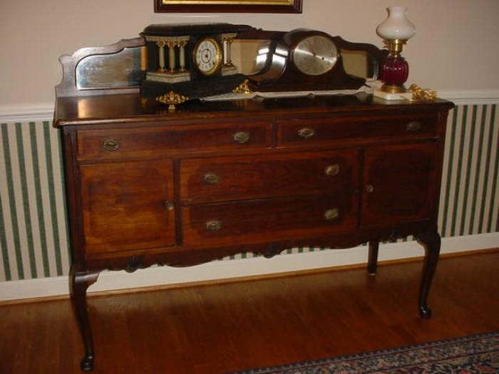1880's antique side board, excellent condition, with two fine mantle clocks and early Fenton glass lamp