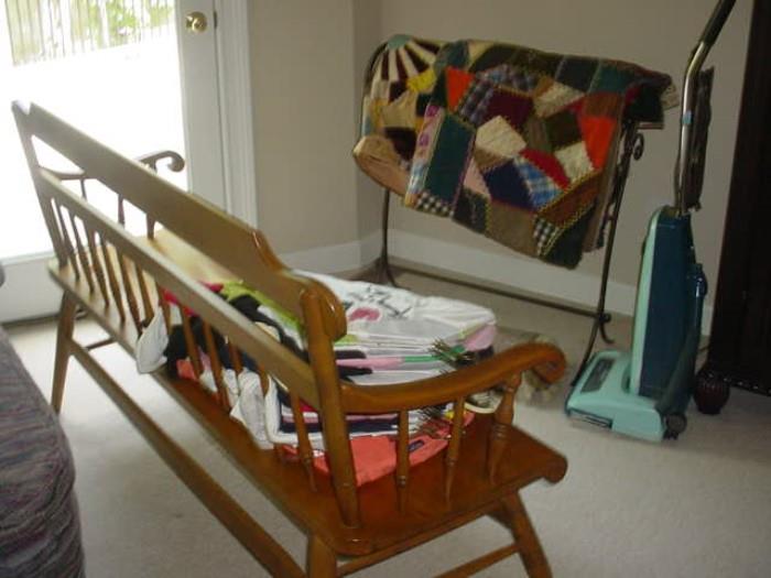 Large farm maple bench with some of the quilts and linens, plus vacuum of course.