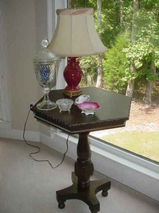 Another incredible antique octagon table wit glassware and vintage lamp