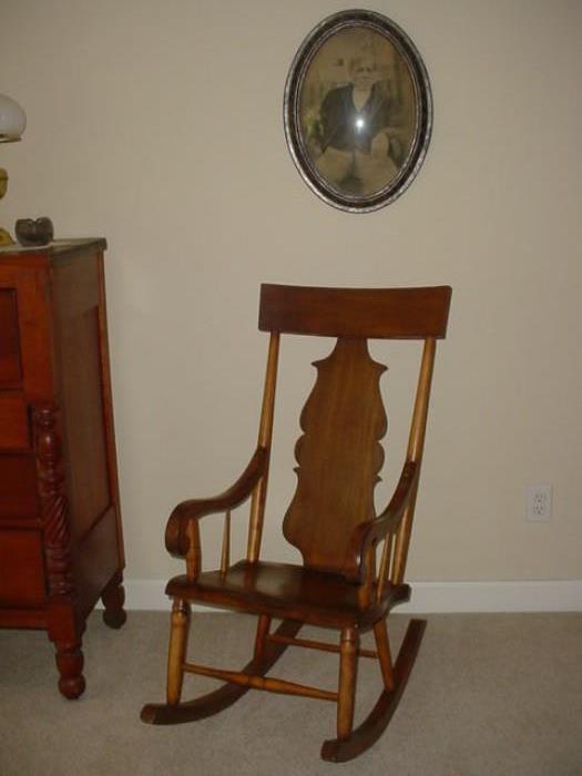 Antique rocker, about 1890, as great grandfather is photograph is above with him sitting in this rocker many years ago.