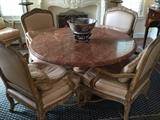 Marble Top Pedestal Table with Six Leather Upholstered Arm Chairs