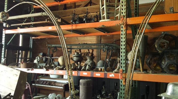 Iron, wood, and various objects of interest in barn.