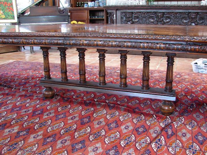 18 foot dining table with beautiful carved ends and center support. $6,500. Chairs also $4,500. Ask to see. Only four will be in the room. Rug, $3,200.