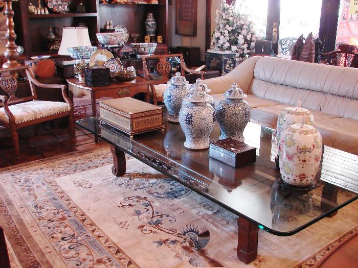 The Asian themed silk living room rug is beautiful and different. $3,400 with Part I Sale discount continued. Coffee table base is made of persimmon wood.