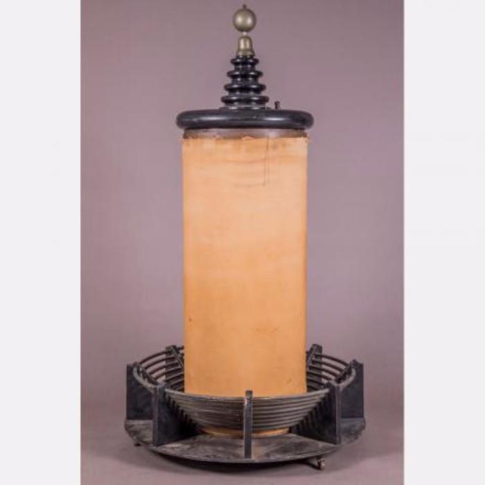 LOT 1 - A Tesla Coil by G.B. Schneeberger
Dimensions: H: 54 Dia: 16 in.
Est: $800-1,200

Description A Tesla Coil (Primary and Secondary) Built by G.B. Schneeberger (1888-1971). Mid-20th Century.

One of the 40 tesla coils built by G.B. With a suitable high voltage AC supply condenser and spark gap, this Tesla coil supposedly gave a 40 inch electrical streamer. Secondary has a protective cover.
