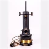 LOT 21 - A Hartmann and Braun Electric Light Source
Dimensions: H: 17 1/2 Dia: 5 1/2 in.
Est: $200-400

Description An Electric Light Source with Scale Holder and Cord by Hartmann and Braun, Frankfurt, Late 19th/Early 20th Century. Used with a reflecting galvanometer or similar instrument.
