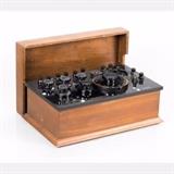 LOT 44 - A Potentiometer
Dimensions: H: 7 1/4 W: 17 1/4 D: 10 1/2 in.
Est: $100-200

Description A Potentiometer by Rubicon Co., Mid-20th Century. Serial number 100379. Used for accurate DC voltage measurements by comparison with batteries of known voltages. Case contains slots so that the instrument could remain connected and yet be covered.
 