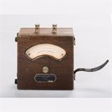 LOT 60 - An AC Ammeter
Dimensions: H: 7 W: 7 D: 3 in.
Est: $40-60

Description An AC Ammeter by Weston Electrical Instrument Co., Newark NJ, Patented 1898. Model number 155.
