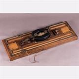 LOT 74 - An Electrical Apparatus
Dimensions: W: 46 1/4 D: 16 1/2 in.
Est: $200-400

Description An Electrical Apparatus by Hartmann and Braun, Frankfurt, 20th Century. Having two slide wire rheostats, a two key momentary contact switches with terminals each marked Batt(ery) and Galv(anometer), a low resistance single pole switch and a heavy iron core inductance with multiple windings.
 
Iron core inductance dimensions: L: 10 5/8 x W: 8 1/2 in.
