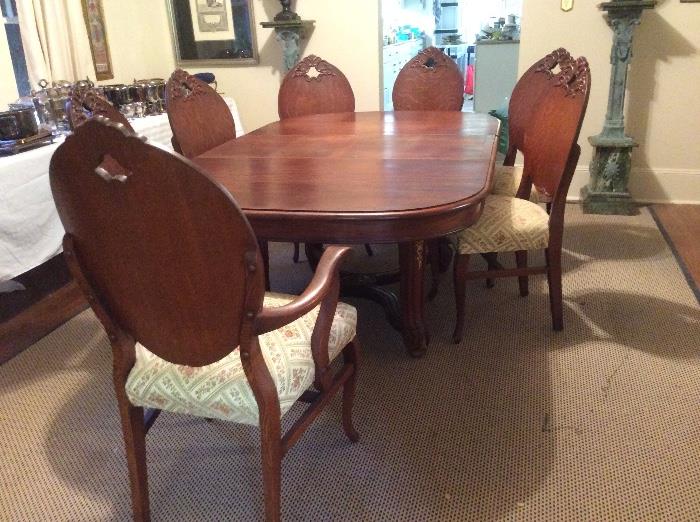 OMG I love these chairs! set of 6, solid shield back chairs in great condition. The table will may be sold separately, its looks Edwardian to me, Ill look closer.