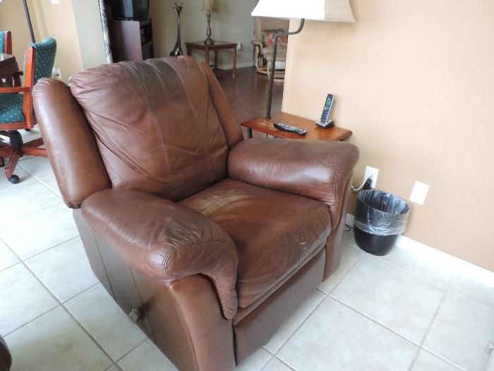 One of 2 Matching Brown Leather Recliners