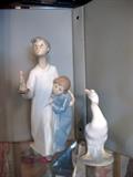 Lladro children in night shirts and duck