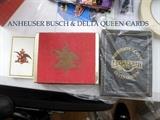 A Busch playing cards and Delta Queen..