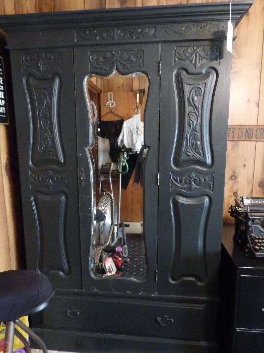 Antique painted carved wood armoire with mirrored door