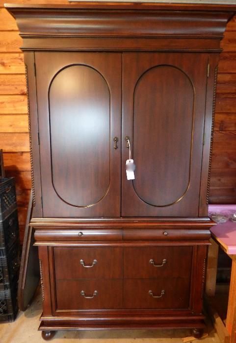 Armoire for TV or hanging clothes at top with drawers