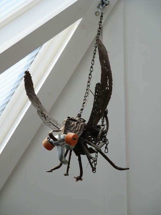 Large metal mosquito sculpture